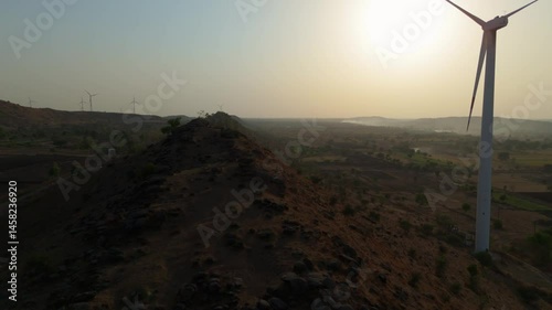 Beautiful evening view of wind mills. 