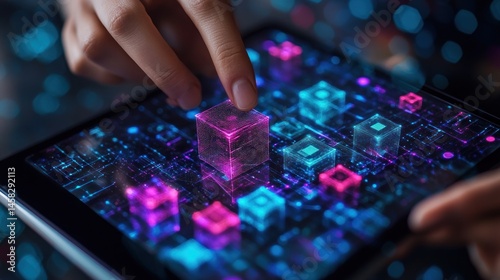 Hands interacting with digital blocks on a tablet