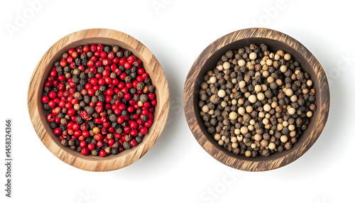 Obraz na płótnie Peppercorn and milled pepper in wooden bowl isolated on white, top view w salonie