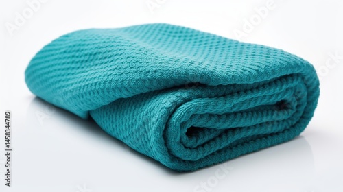 Teal textured blanket folded