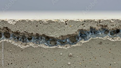 Close-up view of textured concrete surface showcasing unique patterns and embedded bubbles
