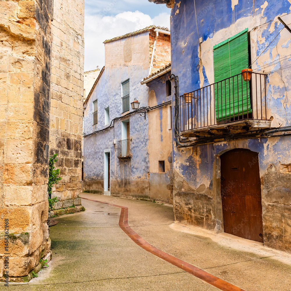 Picturesque houses with blue facades, typical of the region of Matarrana, Rafales, Teruel.