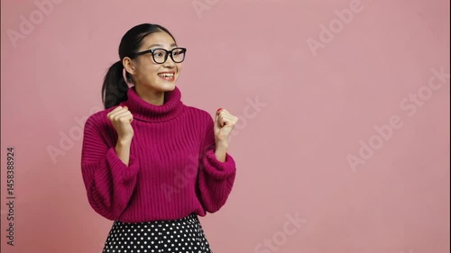 Woman Celebrating with Fist Gesture