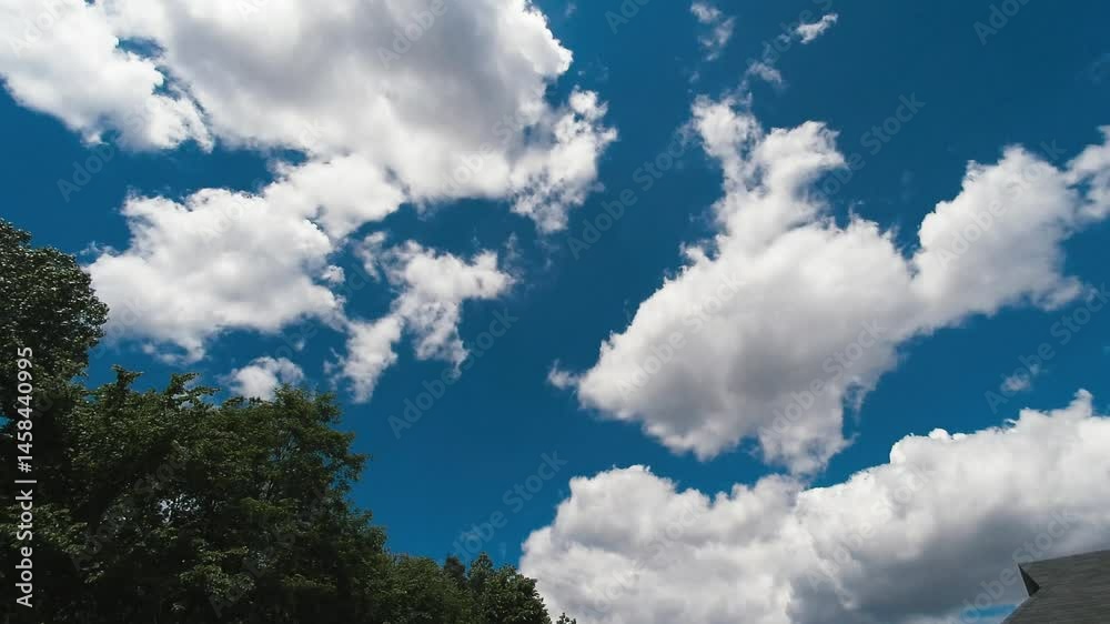 a sunny day with clouds in the sky time-lapse in a suburban backyard a sunny day with clouds in the sky time-lapse in a suburban backyard