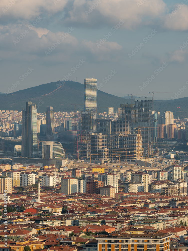 Obraz premium Modern cityscape featuring high-rise buildings and urban development, capturing architectural progress and transformation. Perfect for real estate, construction, and urban development content.