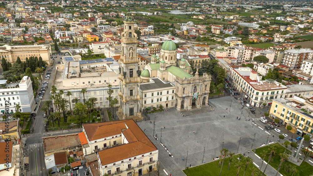 Aerial view of the Pontifical Shrine of the Blessed Virgin of the Rosary of Pompeii. It is a Catholic cathedral, Marian pontifical shrine, and Pontifical minor basilica located in Campania, Italy.
