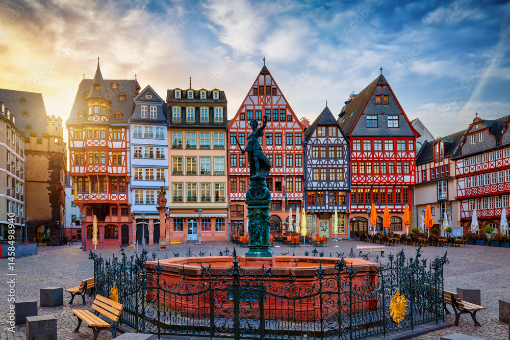 Summer sunrise view of the old town Roemer in Frankfurt am Main, Germany, with the Fountain of Justice and no people