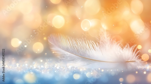 Dreamy feather laying on a sparkling surface against a bokeh background