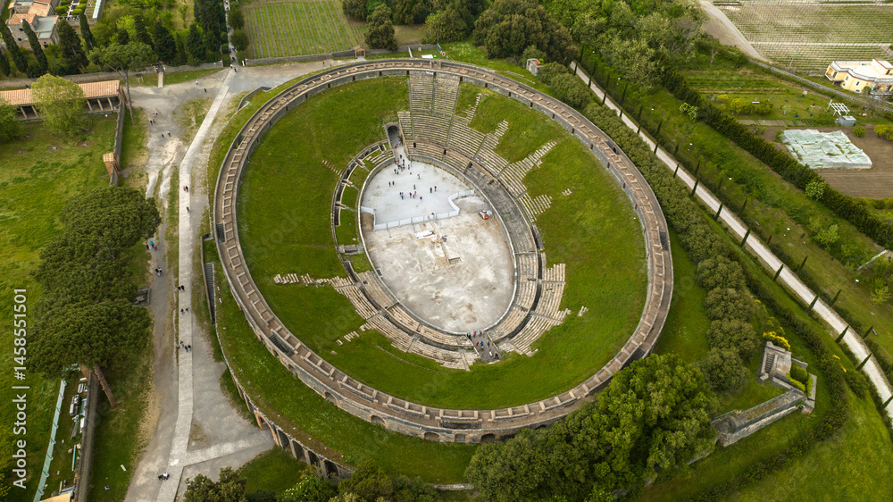 Aerial view of the Pompeii amphitheater located in the archaeological park of the ancient Roman city in the province of Naples, Campania, Italy. It is one of the oldest and best preserved in the world