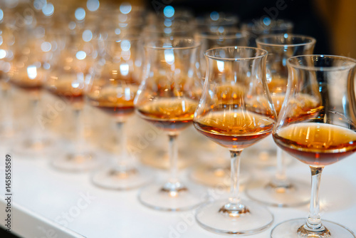 Cognac or brandy in glasses on a table.