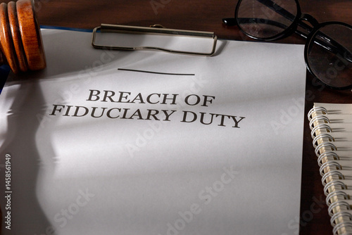 Breach of Fiduciary Duty Legal Form in Clipboard on Office Desk