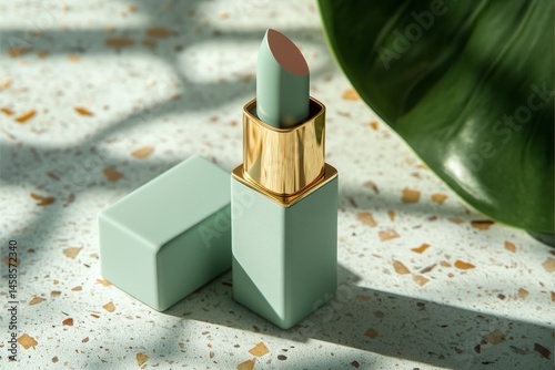Mockup of matte green lipstick with gold edges on terrazzo background