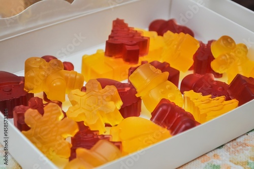Obraz na płótnie A delightful arrangement of colorful and festive gummy candies in a variety of fun shapes. w salonie