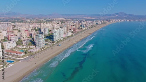 Aerial view drone San Juan beach skyline Alicante Spain turquoise sea shore