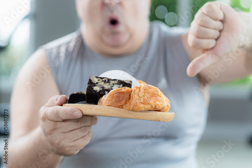 Wallpaper Mural Starting healthy eating; overweight person says no to eat junk food Torontodigital.ca