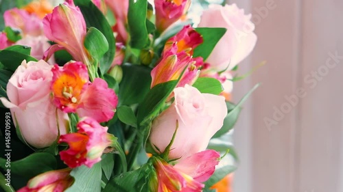 Beautiful bouquet of red roses and alstermeria. High quality FullHD footage