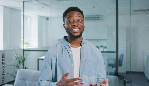 A person is saying thank you with a smile at a business place