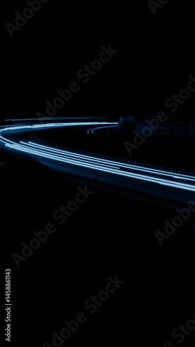 blue car lights at night. long exposure