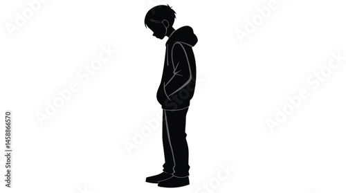 Silhouette of a Sad Boy Standing with Head Down