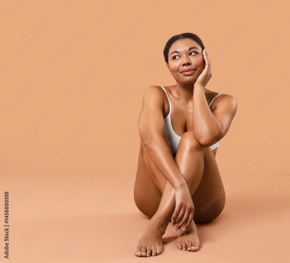 Woman in underwear with smooth skin after epilation procedure on beige background, space for text Woman in underwear with smooth skin after epilation procedure on beige background, space for text