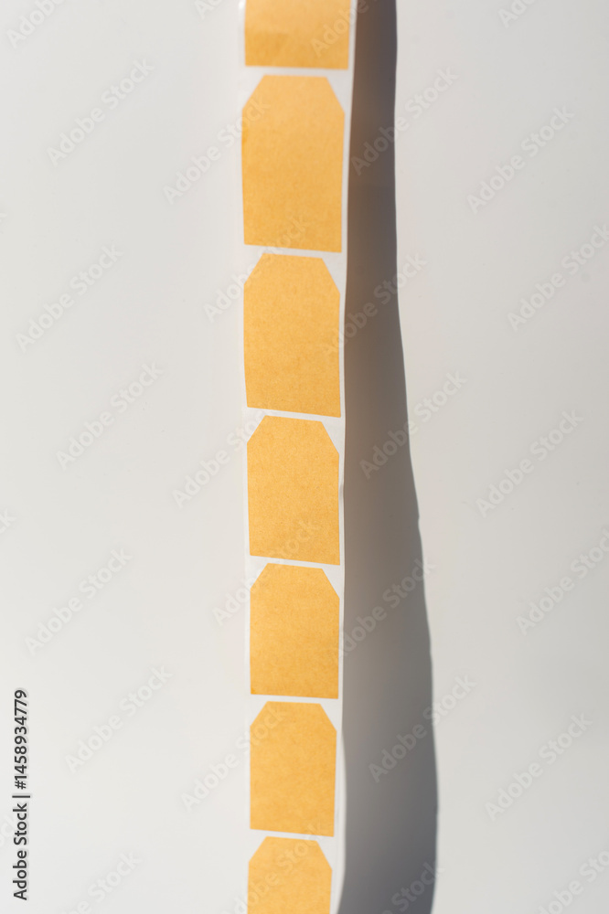 Blank beige sticky notes on white background