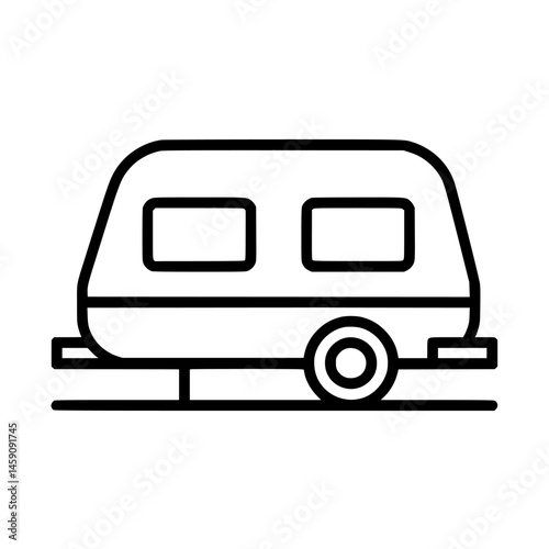 Flat black icon of a simple caravan on a road suitable for travel and outdoor adventures