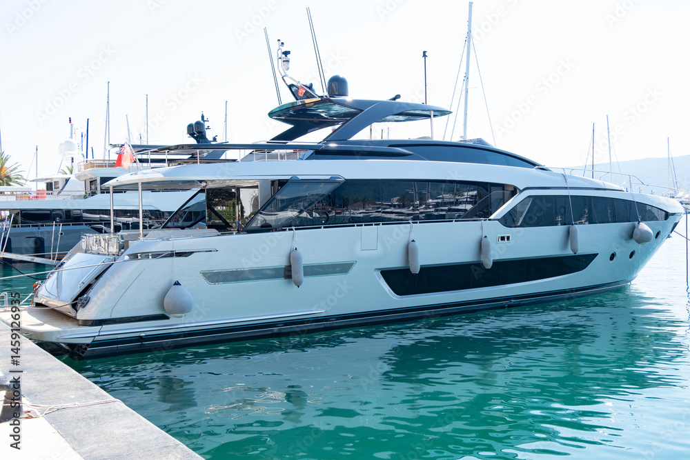 Fototapeta premium luxury private yacht, superyacht shipyards in Mediterranean Sea in marina, charter market, yachting industry, Bay Kotor, Tivat Bay