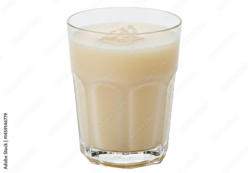 Refreshing iced horchata in a tall faceted glass Refreshing iced horchata in a tall faceted glass