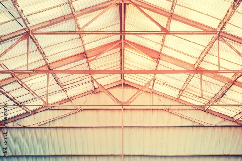 Fototapeta premium Industrial building's interior roof structure.