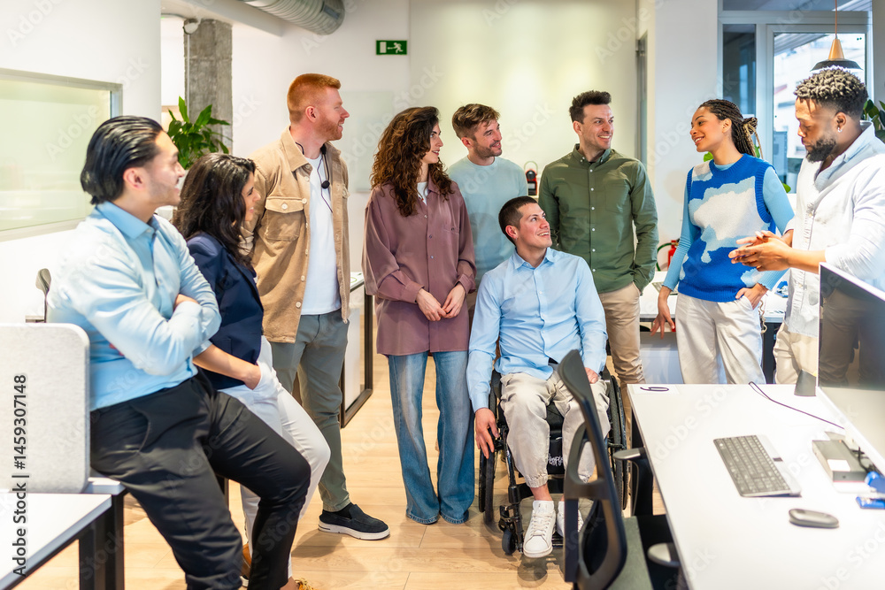 Diverse business team listening to a project manager in a modern office