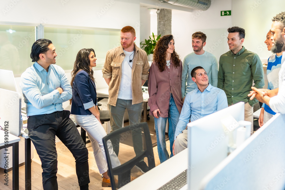 Diverse business team collaborating on project in modern office
