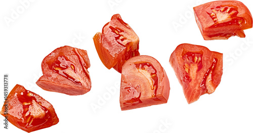 Tablou pe pânză Falling chopped tomatoes isolated on white background with clipping path