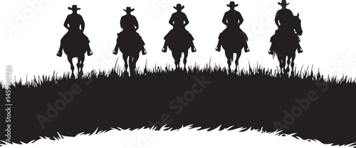 Silhouettes of Four Horse Riders on a Hill