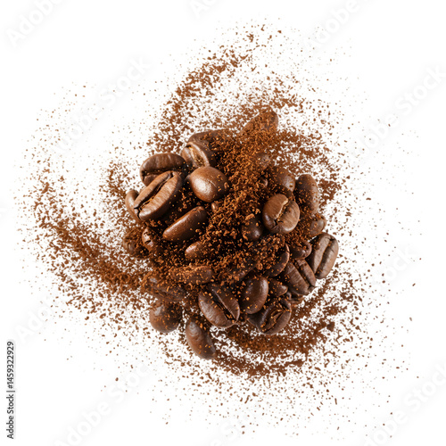 Roasted coffee beans amidst ground coffee