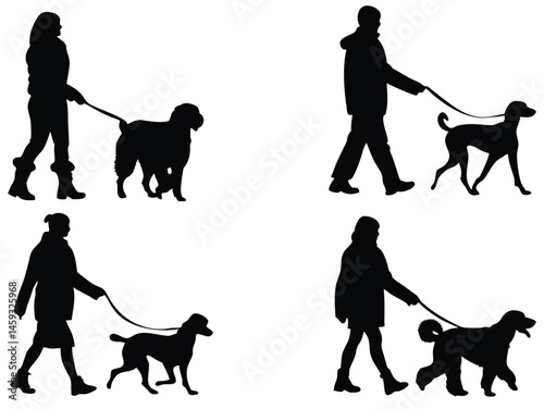 silhouette of people walking dogs