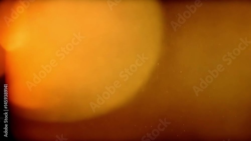 Vintage film burn effect with warm orange and yellow light creating nostalgic mood