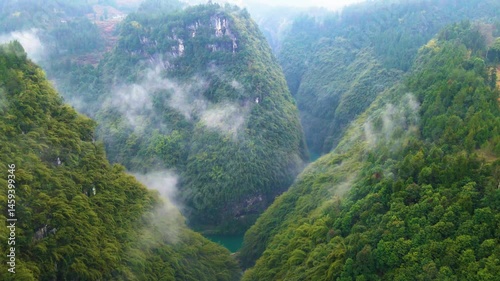 Explore breathtaking aerial views of Ayi River and surrounding mountains