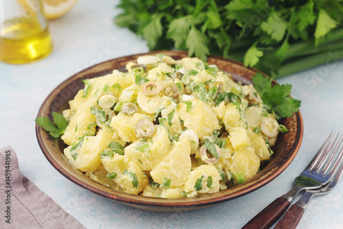 A bowl with Greek potato salads	