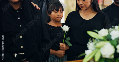 Photos Loss, death or child with flower in funeral farewell service, mourning person or grief