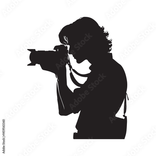 Silhouette of a Photographer Holding a Camera