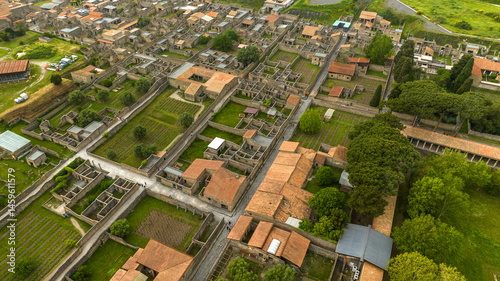 Obraz na płótnie Aerial view of the ruins of houses and buildings of the ancient Roman city of Pompeii. The archaeological park is located in the province of Naples, Campania, Italy. w salonie