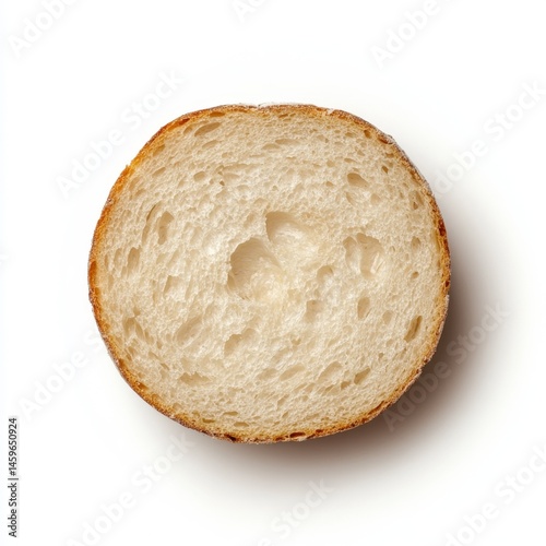 Wallpaper Mural Close-up of a round bread slice, showing the inside texture.  The light-brown crust surrounds a light-beige interior with visible holes Torontodigital.ca