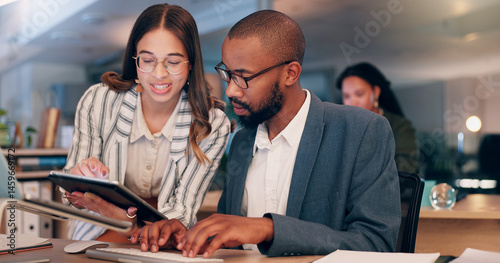 Meeting, colleagues and people with tablet, office and review of project on website and collaboration. Business, media manager and teamwork with tech for brainstorming, man and woman with research
