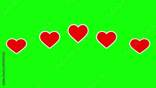 Looping animation of red hearts bouncing on green background
