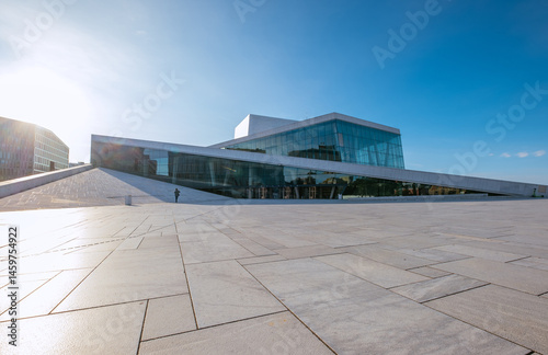 Photography Modern architectural masterpiece with glass facade in vibrant urban setting