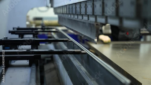 Press Machine Bends Perforated Metal Profile. 