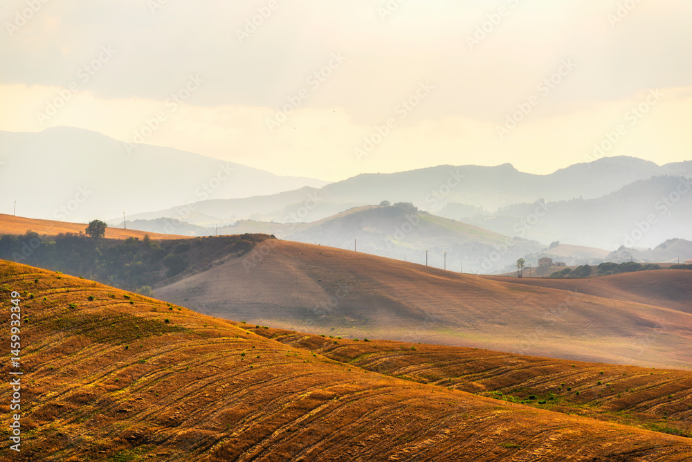 Obraz premium summer sunset over the Val d'Agri hills, Basilicata