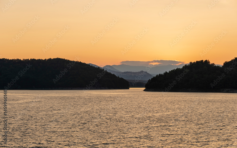 Naklejka premium summer sunset over the lake Pertusillo, Val d'Agri, Basilicata, Italy