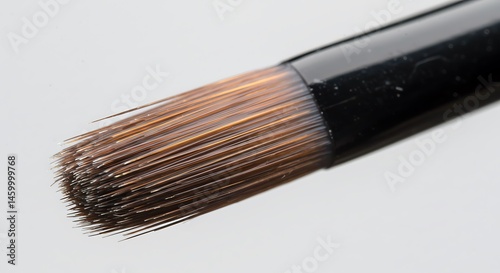 Nail polish brush with perfect bristle alignment.
