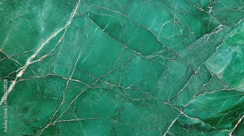 Close-up of the surface green marble, showcasing the intricate patterns texture full background. Luxury green jade stone texture seamless pattern.